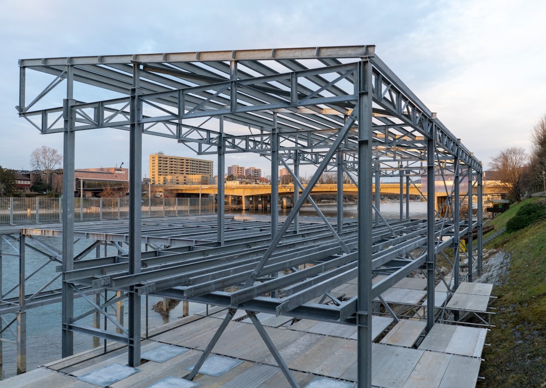 a metal structure sitting on top of a wooden platform